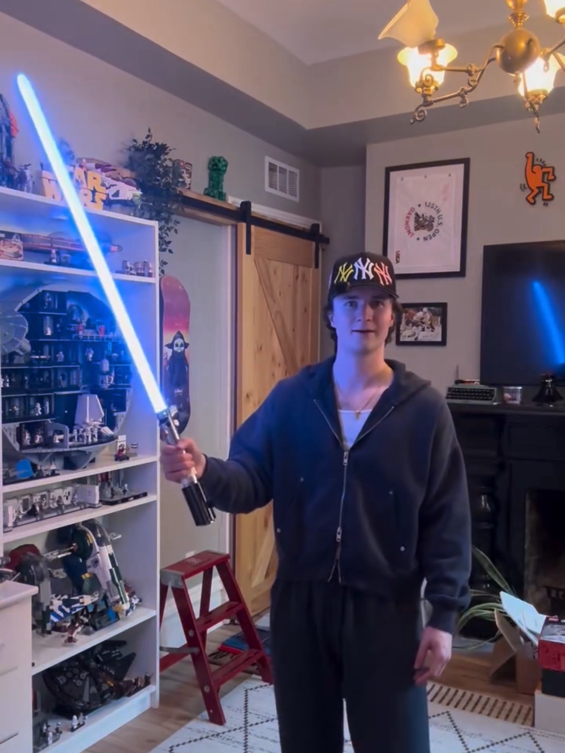 The same creator showing his illuminated SWA Saber on camera